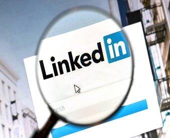 Ostersund, Sweden -August 1, 2015: Linkedin website under a magnifying glass. Linkedin is a business oriented social networking website.